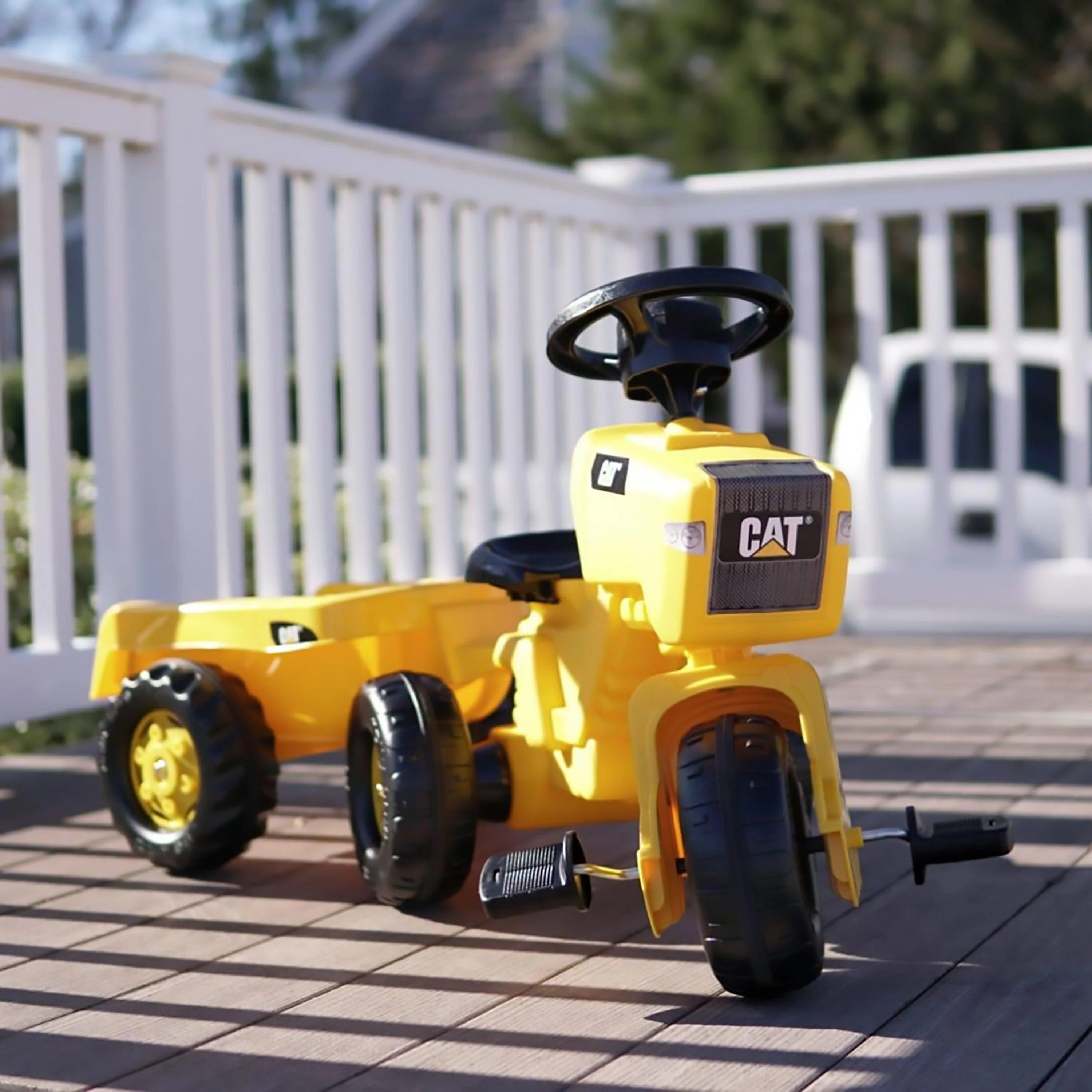 Cat® Ride-On 3-vägstraktor